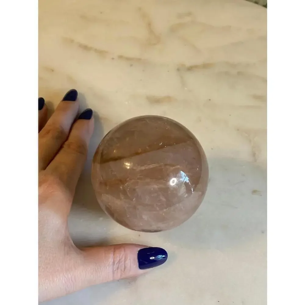 Large hematoid fire quartz sphere
